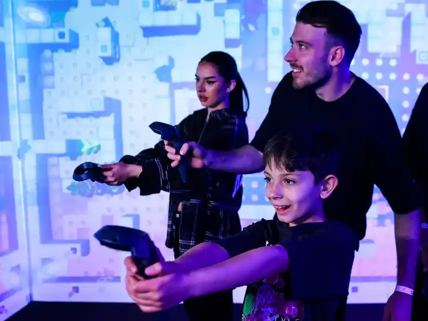 Group enjoying QBIX multiplayer VR gaming experience in Hurricane Utah near Zion National Park